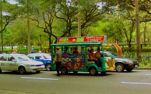 E-Jeepney - In the Philippines jeepneys are the widely used transport of the commuting masses. Now, due to the fact that everybody wanted to do a part in saving our mother earth, then I am proud to say that in the Philippines we are making our efforts too - the E-Jeepneys!  The picture posted here is an E-Jeepney along Makati Avenue, one of the busiest streets in Makati City, Metro Manila.