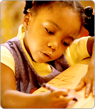 Writing child - Concentrated in writing skill. Writing child - Concentrated in writing skill.