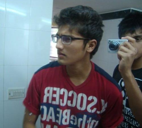 its me - this was a photo taken in my hostel;s washroom....we enjoy a lot doing so....hehe..btw,i dont wear glasses