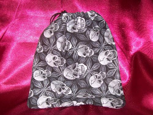 Dice/Tarot bag - One of the things I do in my free time is make large dice bags from scratch. It gives me something to do and I enjoy it. They work wonderfully for large collections of dice. Considering that I roleplay, I have quite the collection of dice.