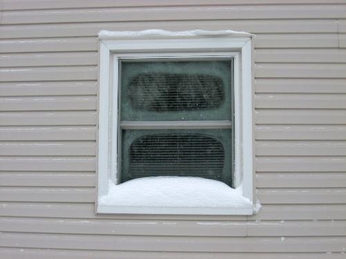Snowy Scene - One of my living room widows after a 7 inch snowfall with high winds.