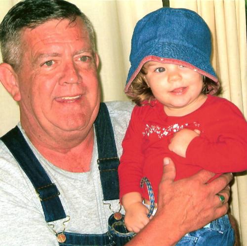Proud pawpaw and a happy Alivia - Picture taken a few years ago. Alivia is just one of 8 grandkids that makes this pawpaw so proud.
