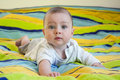 baby - baby lying on rug on tummy