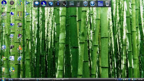Desktop screanshot - Here is a screan shot of my current desktop background. It came with the computer, I'm not going to change it until the computer is paid off. But here it is anyway. Since its a screan shot you get to see all my lovely icons and stuff that's also part of it. So um yeah..... a bit of a personal touch if I do say so myself.
