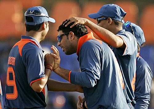 Indian player - yuvaraj got a wicket and Indian player are celebrate that.