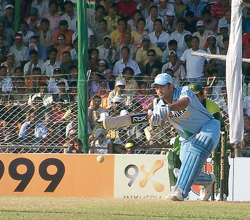 Indian captain - The Indian captain hitting the ball.