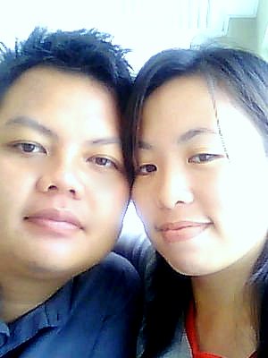 Happy together - I use my laptop's web cam to take this pic. We were waiting for the bus at that time :-)