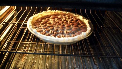 Pecan Pie  - My first pecan pie baking in the oven.