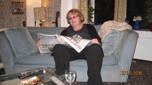 Catching up on the news - My friend Helen, in a rare quiet moment. With 5 children and 8 grandchildren, all living close by, she's a very busy lady.