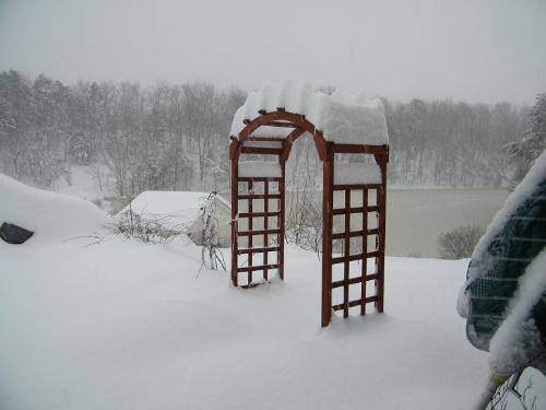 Entrance to my garden. Ha! - It's white as far as the eye can see. Well, it's white beyond that, too. We may have a grand total of 3 1/2 to 4 feet of snow by the time this ends!