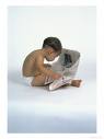 Important of Newspaper Reading - A baby reading news paper.