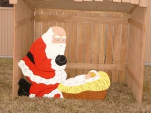 Santa and Jesus - Santa knows that Jesus has to be adored.