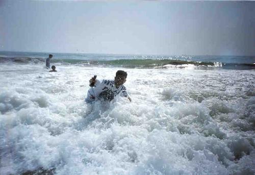 Puri - One man enjoying the sea in Puri.
