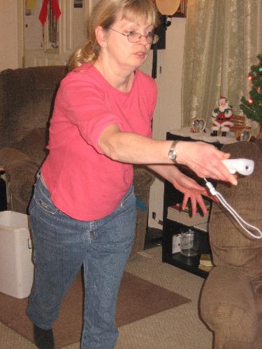 My wife - She loves the Wii system we bought ourselves for a Christmas gift