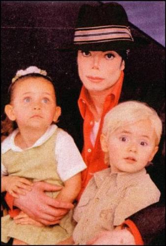 The Family - As you can see, there is Michael Jackson posing with Paris and Prince I. Probably Invincible era :)