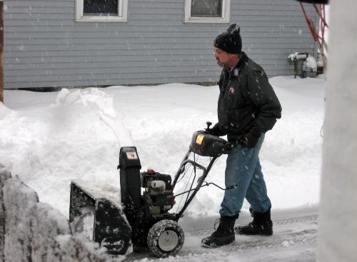 Clearing my driveway - My neighbor helped me out as a randopm act of kindness CHristmas morning by plowing 4 inches of wet, heavy, sloppy, snow and rain mix from my driveway.