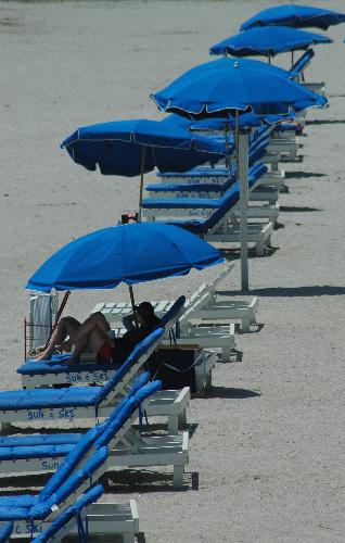 Beach Blue Umbrellas - Join us on a visit to Charleston beach and hang out at the umbrellas - as you can see, plenty of space available. Photo taken with Nikon D70.