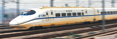 A bullet train runs on the Wuhan-Guangzhou high-sp - Competition between airlines and rail operators will further hot up on Saturday thanks to the launch of China's longest high-speed train link between Wuhan and Guangzhou.  The line stretches more than 1,000 km and will slash the travel time from Wuhan, Hubei province, to Guangzhou in Guangdong from 10 hours to just three.  Tickets for the service - which also stops at Changsha, capital of Hunan - went on sale at new stations in the three cities last weekend, with prices ranging from 780 yuan ($110) for first class to 490 yuan for second class, said a joint document released by the National Development and Reform Commission and the Ministry of Railways.