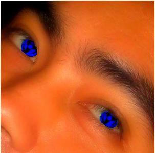 Blue Sharingan - Close up picture. Capture when im on a gimmick with my friends. And in the middle of happenings i didn't notice that my black eyes just started to turn blue. My friend only notice it, and i had to hide, for i dont want anybody to see my eyes. In order to hide it from my friend, i told him that im just wearing a contact lense. And so it begins.........