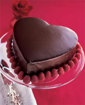 love - a heart-shaped chocolate raspberry cake