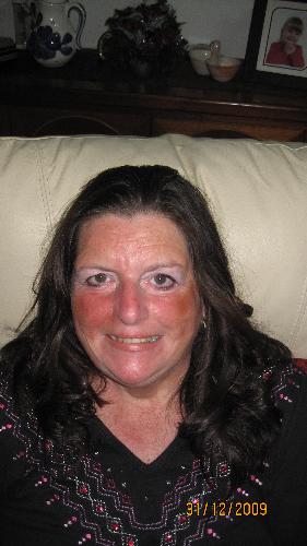 Me on New Year's Eve 2009 - Here's a sight you don't see very often - me letting my hair down - in all senses of the phrase!