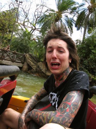 my husband - my (not real) husband on the Jurassic Park ride.