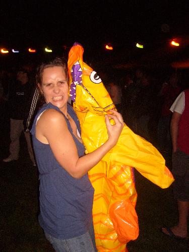 Girl dancing with blow up shark - girl dancing with blow up shark in the dark