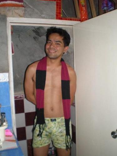 me - these picture of mine taken at the house of my friend. we got chill and we decided to take some pics for a remembrance and also for friendster.