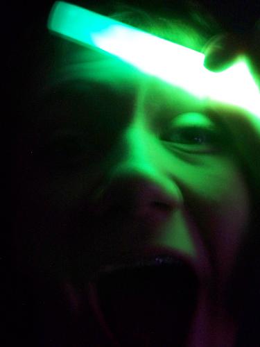 glowy - Just a photo of me with a glow stick. I took it about 3 years ago. 