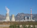 power plant - It is a view of power plant where one can see the chimney easily from the top of which smoke is coming out. power plant - It is a view of power plant where one can see the chimney easily from the top of which smoke is coming out.