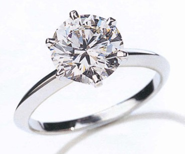 Engagement ring - white gold engagement ring with a diamond.