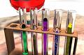 Chemicals on test tubes - We can see in the picture a very important part of a chemistry laboratory. You can see the different chemicals present in test tubes. Is it not looking good to watch?