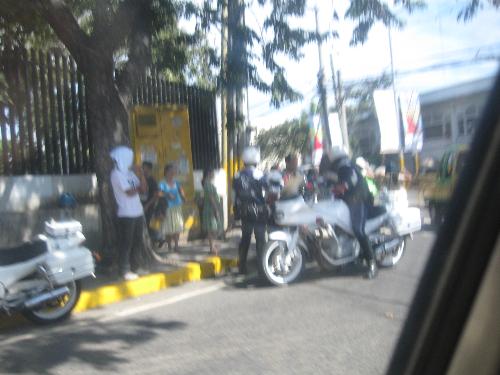 traffic enforcers - traffic enforcers/officers parking in a corner of the road