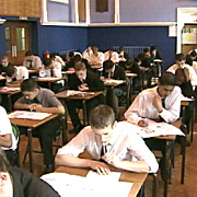 examination hall - The picture shows that an examination is going on in a classroom. There will be many of them who are going to fail in their papers. 