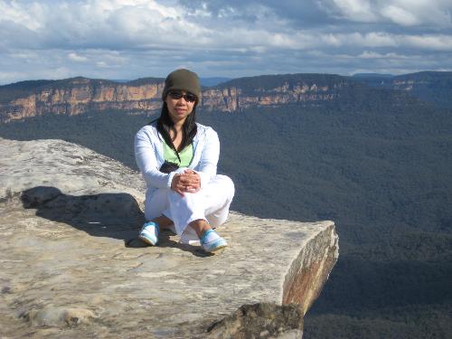 blue mountains - On a cliff on blue mountains, i saw a photo exactly on this place on the brochure given to us for the trip so i thought i'll copy the girl's pose. I didn't realize that it was really the very edge of a cliff. My sister who took the photo was more afraid than I was!
