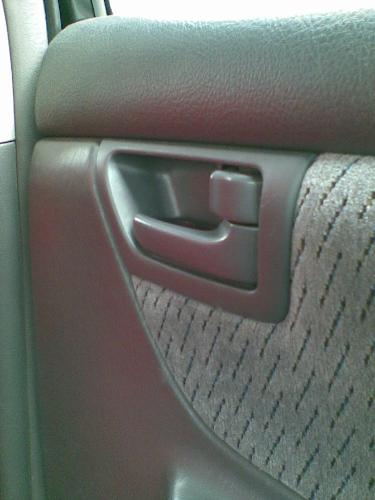 car lock - a locked door of a taxicab I took
