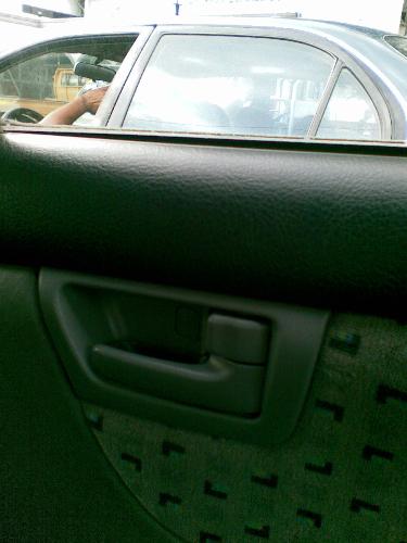 car door lock - locked right back door of the taxicab I took