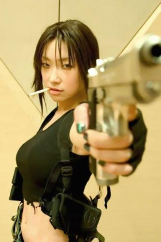 rebecca with guns - rebecca posing with guns
