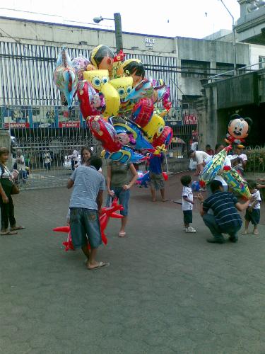 street vendors - a vendor selling balloons