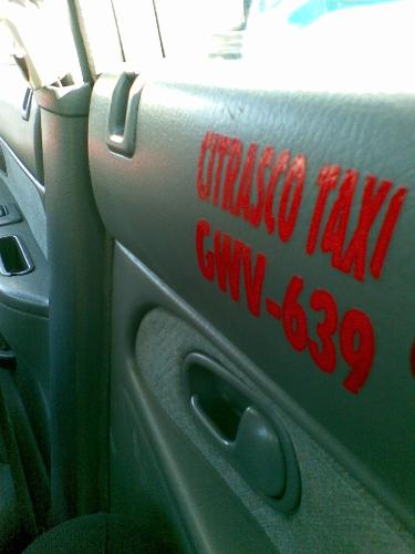 taxi door lock - an unlocked back door of a taxicab