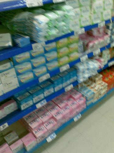 bath soap - bath soaps of different brands seen on display in the grocery section of a store