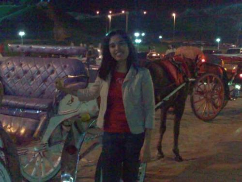 in al ain - posing with a horse in al ain! :)