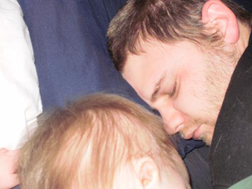 My Two Boys - My husband and son both asleep together in bed. Its rare not only that my son sleeps, but that i see the two of them sleeping together. It was definitly a Kodak Moment.