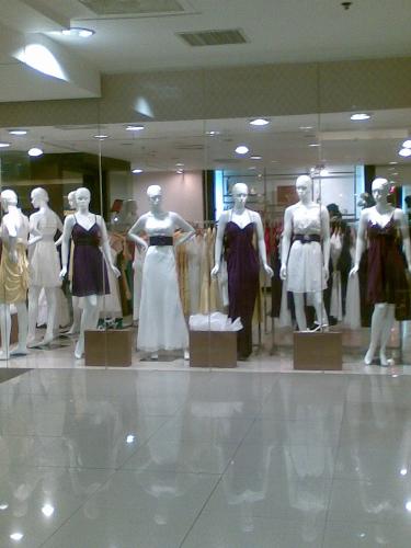 gowns - gowns and dresses on display in a mall