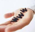 Internet - We can see a hand holding three letters:WWW