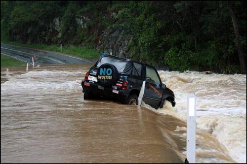 Oops, we do have worries! - Picture of a car trapped in flood water on Australia's Gold Coast. Oops, we do have worries! - Picture of a car trapped in flood water on Australia's Gold Coast.