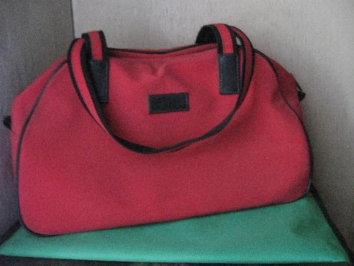 bag - bag which can also double as a sports bag to carry smaller items