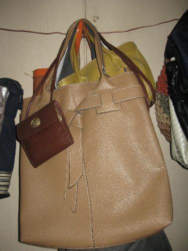 bags - a few bags hanged on the wall