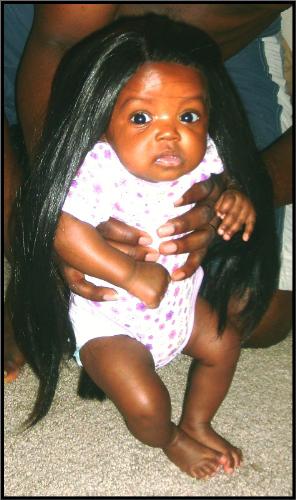 baby wig - a baby in her wig