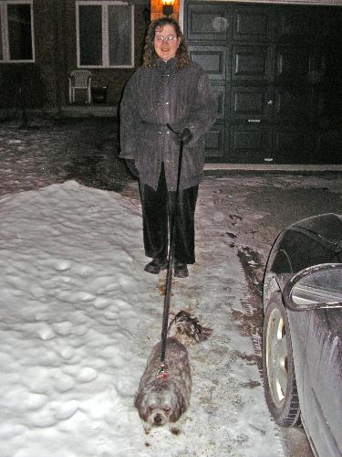 My dog and I out for our walk - This photo was taken in the winter. I guess it was taken at night near our home.